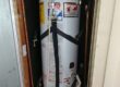 Lifting the Water Heater into a raised cabinet